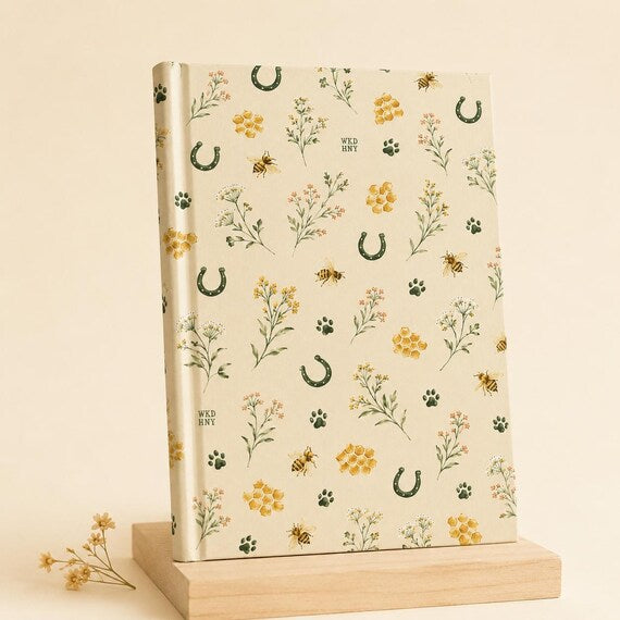 Bee and Horseshoe equestrian hardcover journal lifestyle view